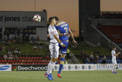 Jets Jason Hoffman competes with the Victory's Daniel Georgievski in their nil-all game at McDonald Jones Stadium, Newcastle on Monday the 13th of February, 2017.