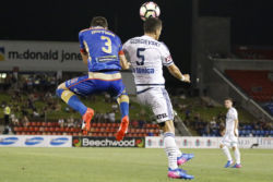 Jason Hoffman and Daniel Georgievski leap high in their nil-all game at McDonald Jones Stadium, Newcastle on Monday the 13th of February, 2017.