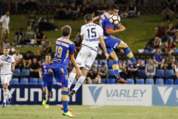 Heads up as the Jets Andrew Nabbout, Morten Nordstand and Victory's Alan Baro vie for the ball in their nil-all game at McDonald Jones Stadium, Newcastle on Monday the 13th of February, 2017.
